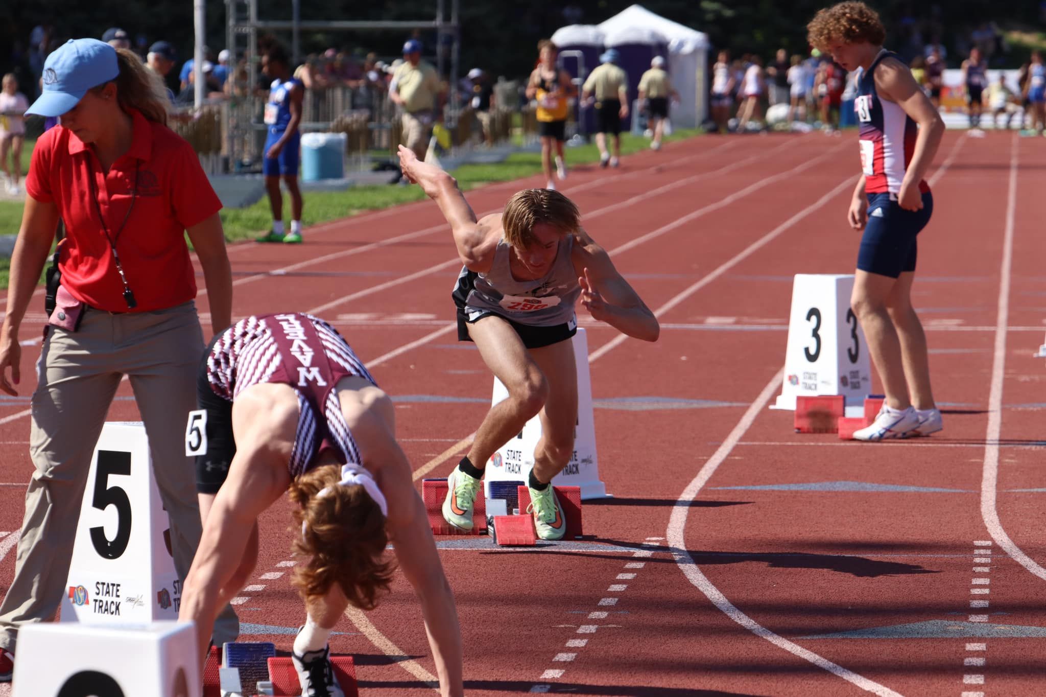 Sidney senior Mitchell Deer fires off the blocks at the start of the Class B 400-meter dash finals at the Nebraska high school state track and field meet on Thursday. Deer claimed the all-class gold medal with a time of 49.42.