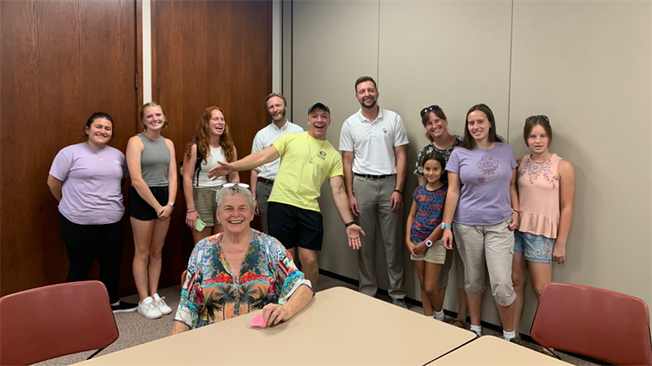 Familia attendees including Chadron State College employees, students, and Chadron community members pose in the Student Center.