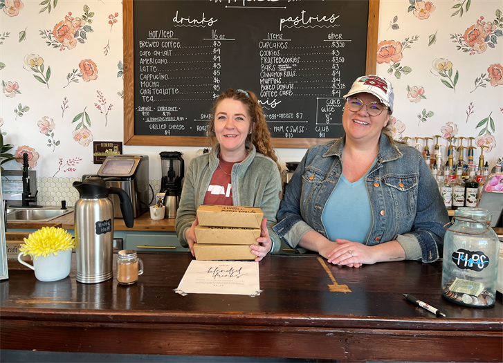 Joey Straber, left, with Wildeflower Baking Company owner Amy Richard.