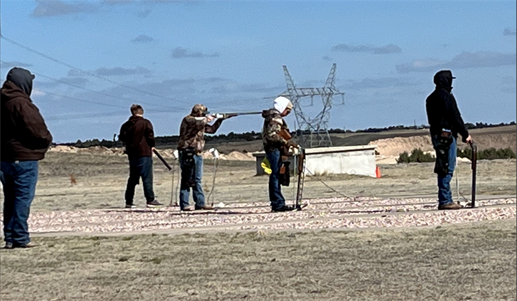 Competitors line up for the trap shooting competition Saturday in the Jim Pohl Memorial Youth Shoot.