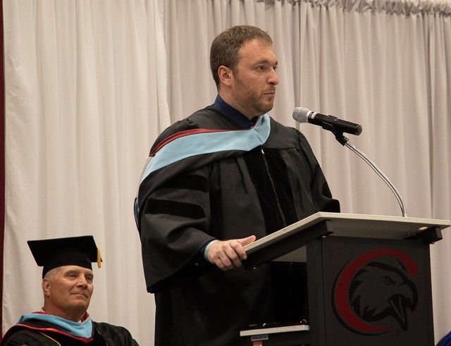 Michael Sandstrom, CSC alum and Chadron High School History and Civics teacher, speaks during Chadron State College's commencement May 6, 2023, in the Chicoine Center.