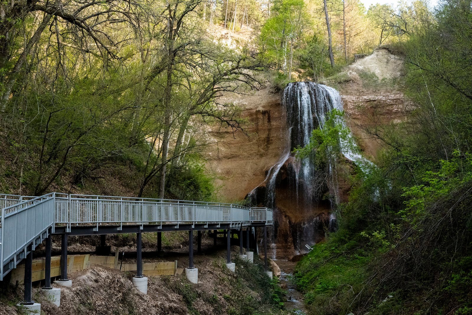 The new boardwalk, constructed of composite decking on a steel frame, leads visitors to Smith Falls.
