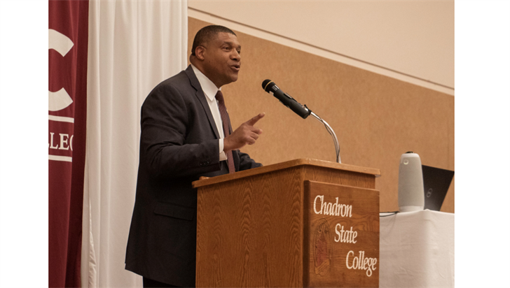 President Ron K. Patterson speaks to an audience in the Chadron State College Student Center in April 2023.
