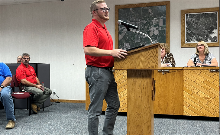 Sidney Finance Director Lane Kizzire presents the 2023-2024 budget to the city council.