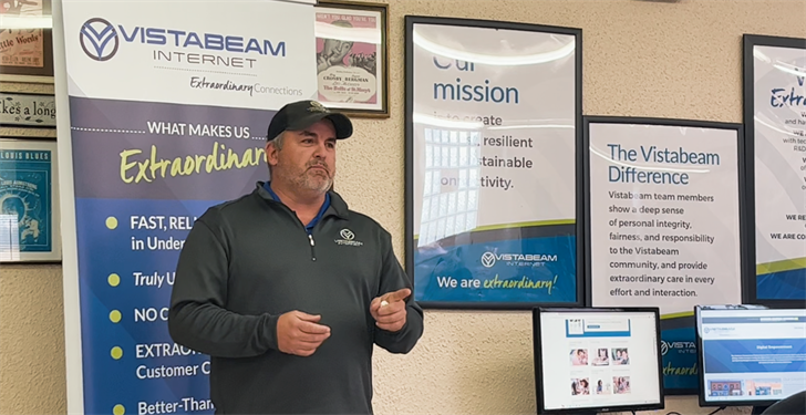 Matt Silverman explains a program offered by Vistabeam Internet to help seniors learn how to use computers and the internet.