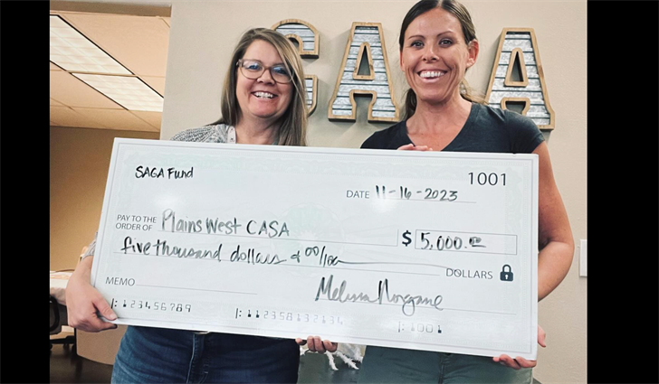 Krista Bruns, left, of Plainswest CASA, and Melissa Norgard of Sidney and Greater Area Fund (SAGA Fund). SAGA awarded $5,000 to Plainswest CASA.