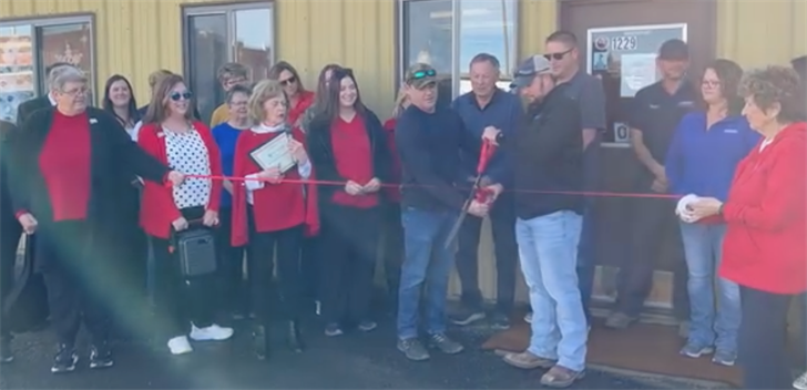Sidney Auto Sales and Adams Auto Sales & Leasing held a ribbon cutting December 6 recognizing their partnership.