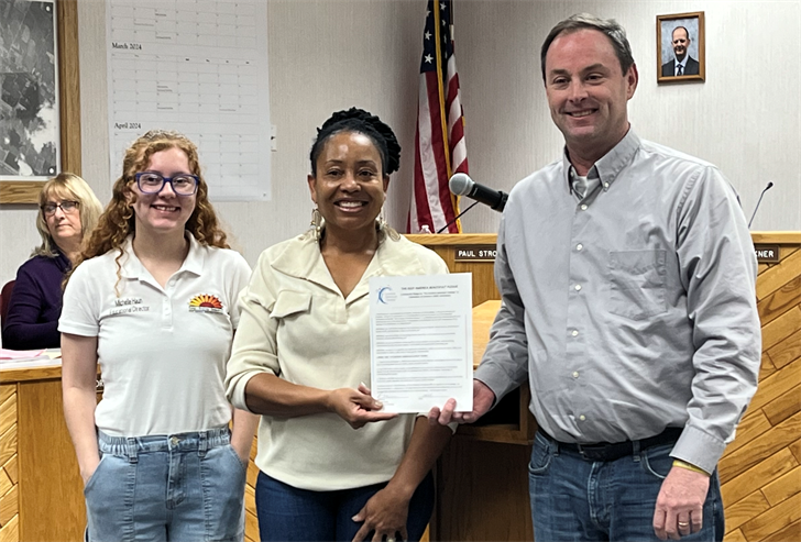 Pictured from left: Michelle Haun (Keep Sidney Beautiful educator), Lasandra Buckner (KSB director) and Sidney mayor Brad Sherman.