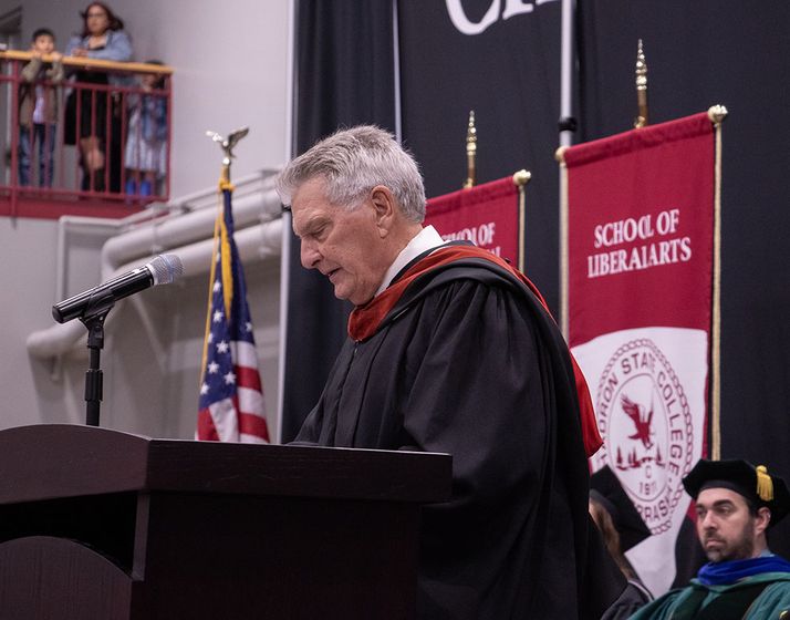 Former Nebraska State Senator John Stinner Sr. speaks at Chadron State College commencement in the Chicoine Center on May 4, 2024.