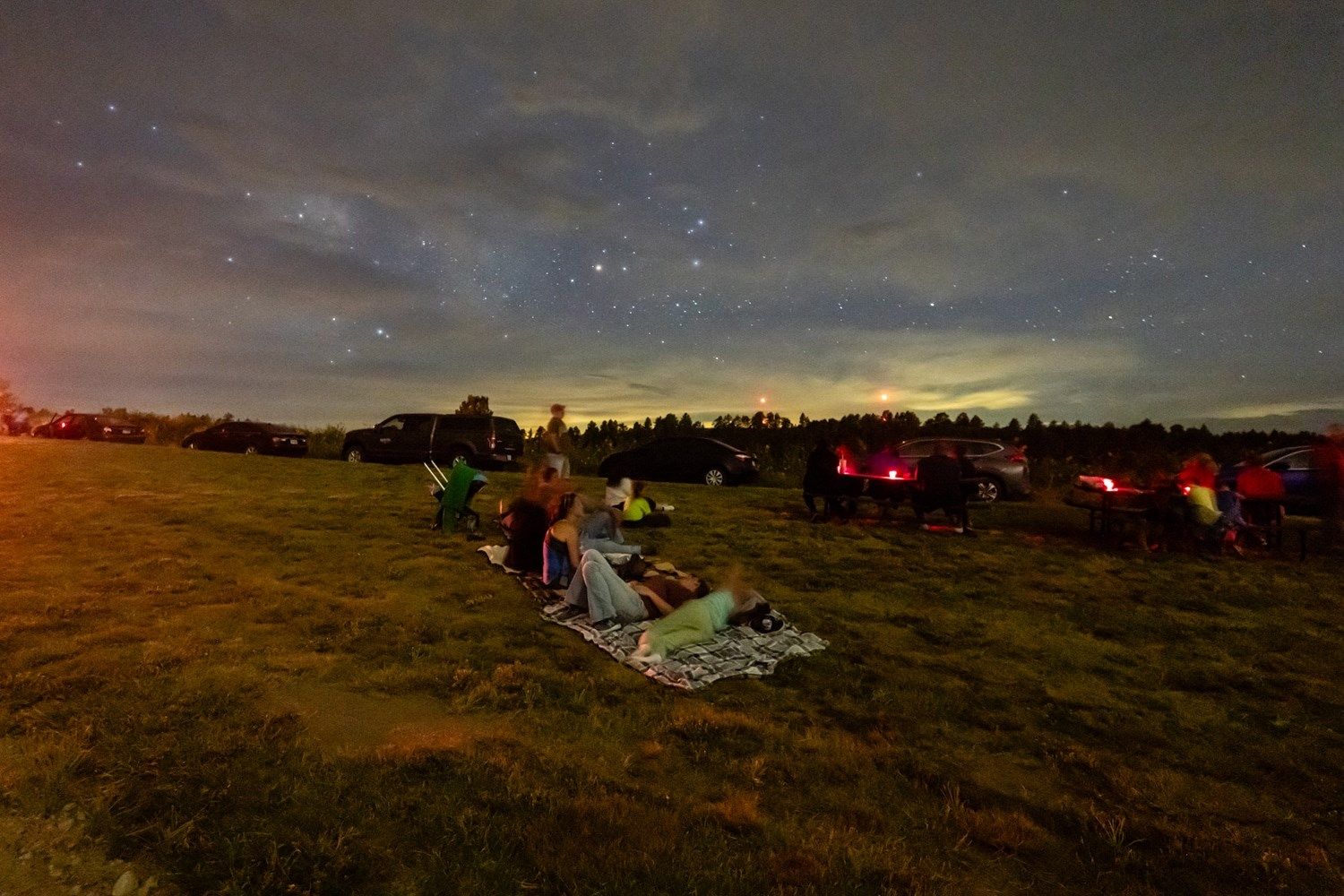Attendees of a night sky educational program at Wildcat Hills State Recreation Area in Scotts Bluff County enjoy the sights of the night sky.