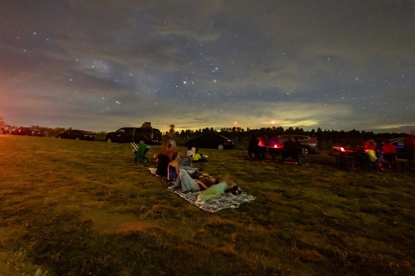 Attendees of a night sky educational program at Wildcat Hills State Recreation Area in Scotts Bluff County enjoy the sights of the night sky.