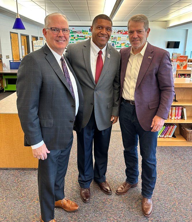 Dr. Brian Maher, Nebraska Commissioner of Education, Dr. Ron K. Patterson, President of Chadron State College, and Nebraska Gov. Jim Pillen, pose Nov. 7, 2024 in the Scottsbluff Public Schools.