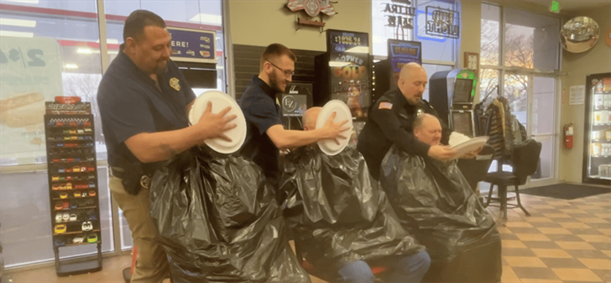 Sidney Police officers won the challenge and planted pies in the faces of three Sidney Volunteer firefighters in support of the Make-A-Wish Foundation.