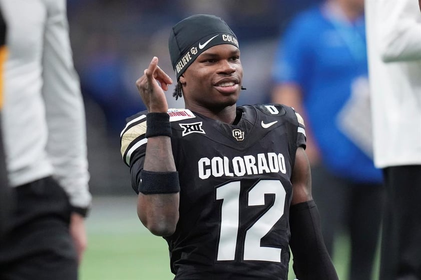Colorado wide receiver Travis Hunter (12) warms up for the Alamo Bowl NCAA college football game against BYU, Dec. 28, 2024, in San Antonio.