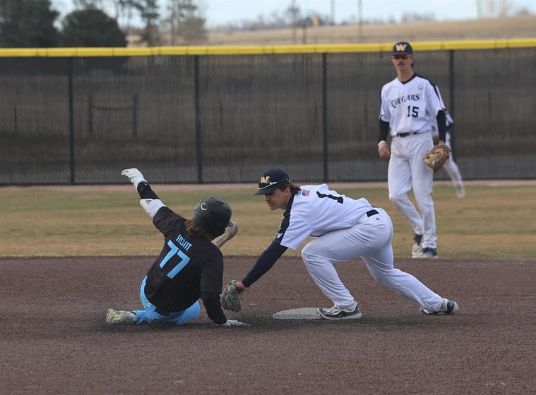 Landon Lockwood applies the tag to a Southeast runner in game two of their doubleheader on Friday.
