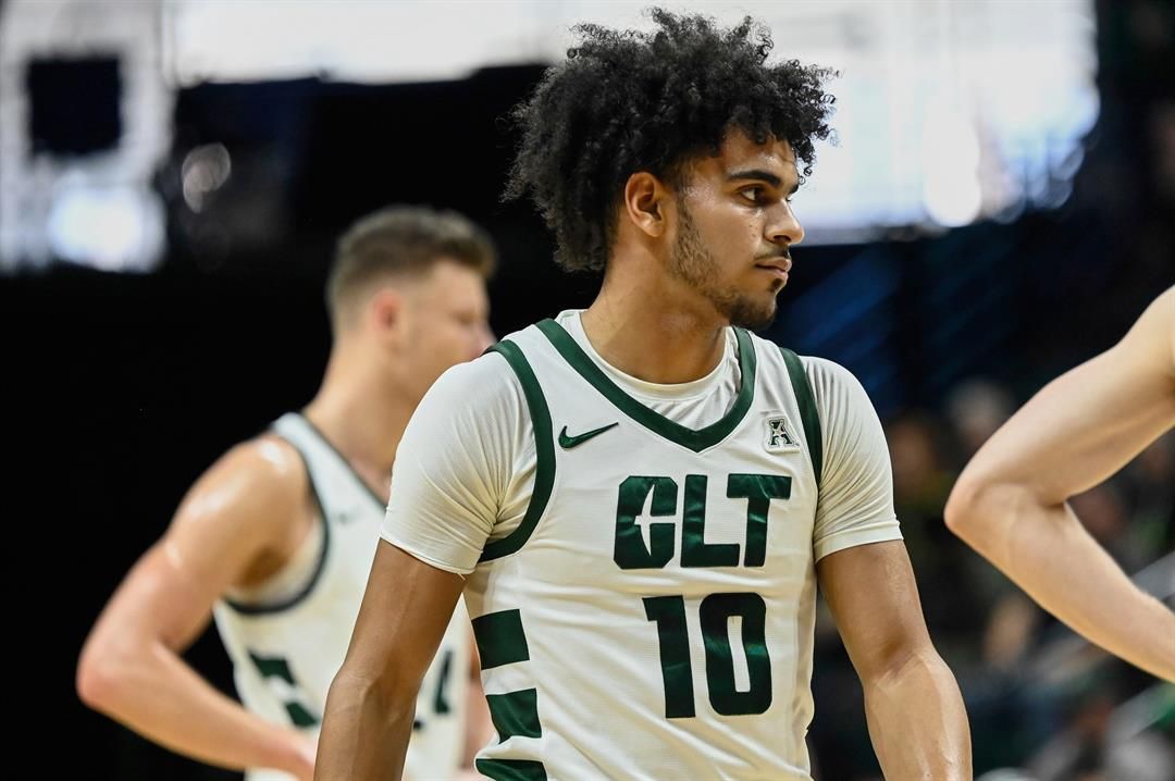 Charlotte 49ers guard Nik Graves (10) looks on during the first half of an NCAA college basketball game against South Florida on Saturday, March 2, 2024, in Charlotte, N.C.