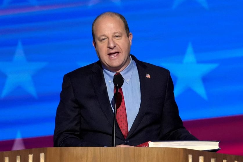 Colorado Gov. Jared Polis speaks during the Democratic National Convention, Aug. 21, 2024, in Chicago.