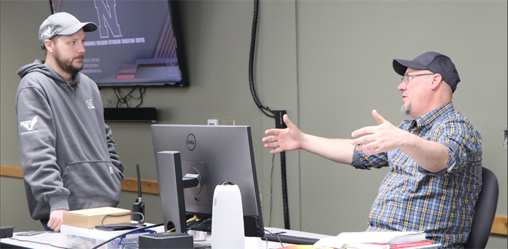 Dr. Dirk Charlson, right, Nebraska Extension Educator, discusses drone flying with Jesse Fulton at a previous pilot prep course in Scottsbluff.