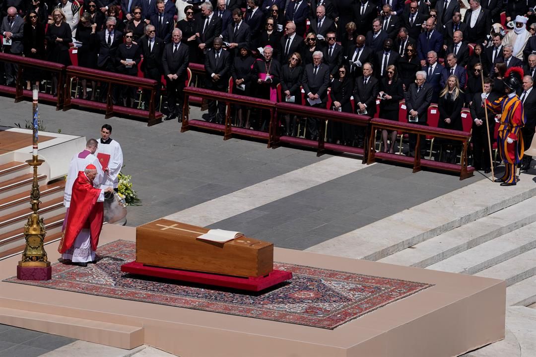 Dean of the College of Cardinals Giovanni Battista Re spreads incense around the coffin of Pope Francis during his funeral in St. Peter's Square at the Vatican, Saturday, April 26, 2025.