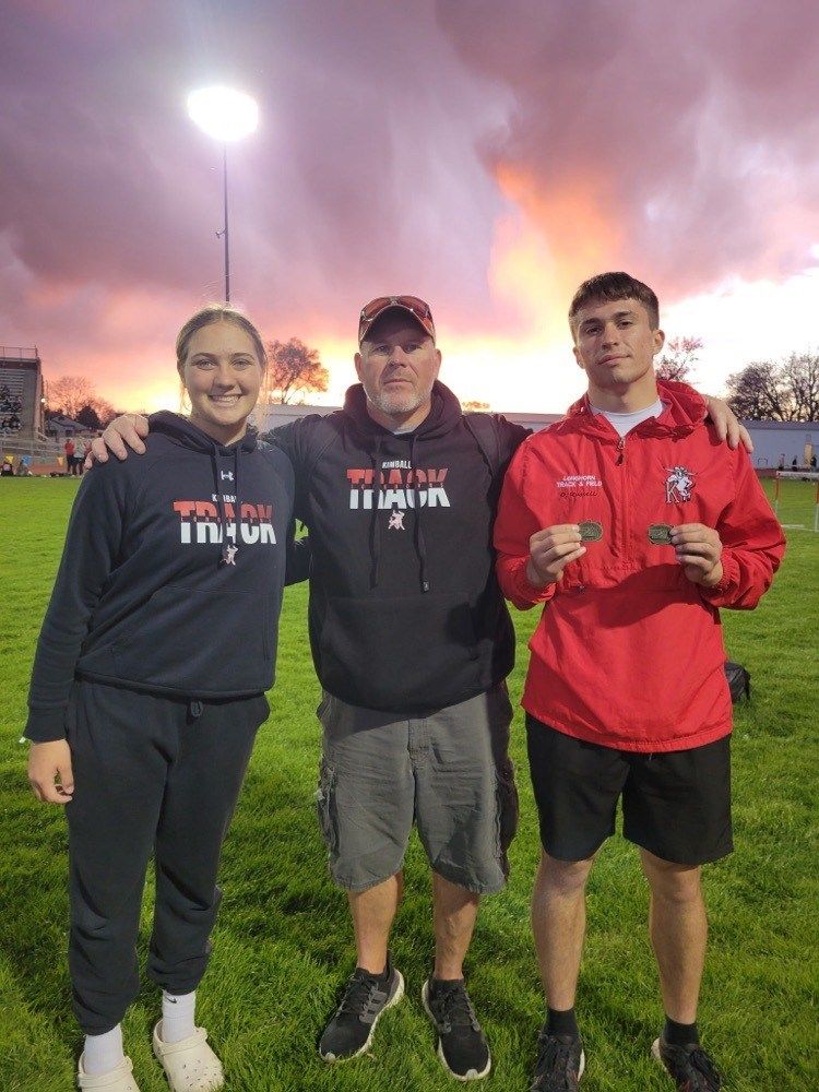 Pictured from the left are JaLeigh Bohac, Track Coach Dane Wurdeman, and Derek Russell. Photo courtesy of Kimball Public Schools.