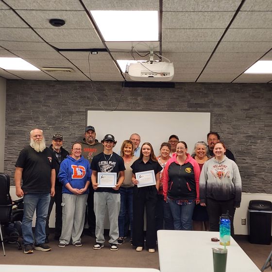 Kirstin Dougherty and Jashawn Davenport were awarded automotive scholarships from the Cruise 'N Class Car Club.