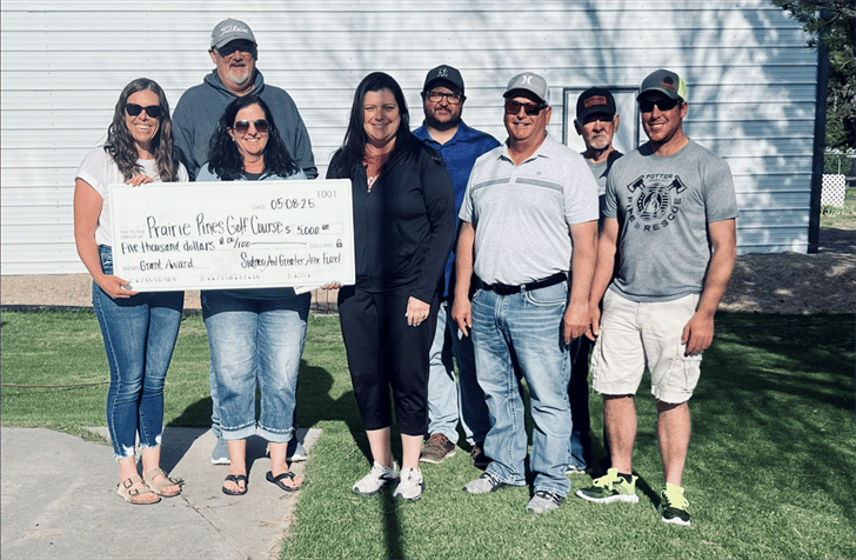 Pictured left to right: Melissa Norgard, Lane Juelfs, Kristi Jung, Lori Biesecker, Jeremy Wiekhorst, Scott Dvorak, Mike Slama and Jeremy Gasseling.