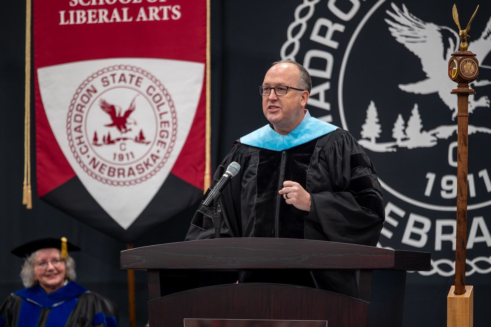 Dr. Charles L. Welch delivers the Commencement address at the 2025 Spring Commencement ceremony in the Chicoine Center, May 10, 2025.
