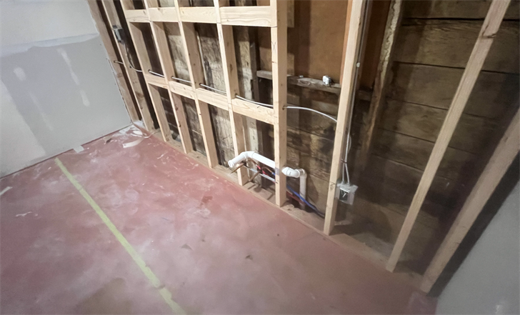 Workers found bone fragments, glass shards and metal at two separate locations while renovating an office building with 100-year or more history in Sidney.