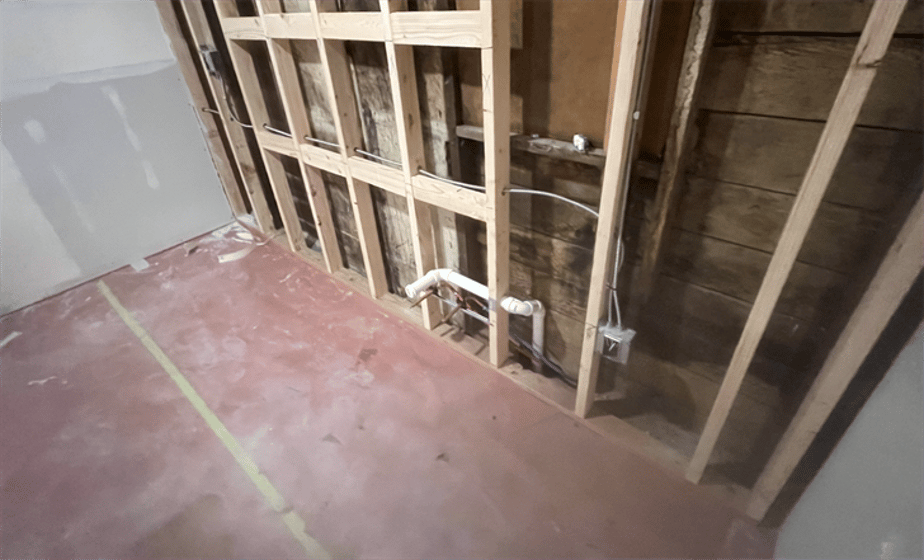 Workers found bone fragments, glass shards and metal at two separate locations while renovating an office building with 100-year or more history in Sidney.