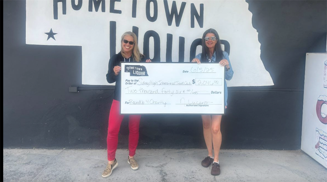 From left: Tara Gray of Hometown Liquor and Tanya Flores-Lewis.