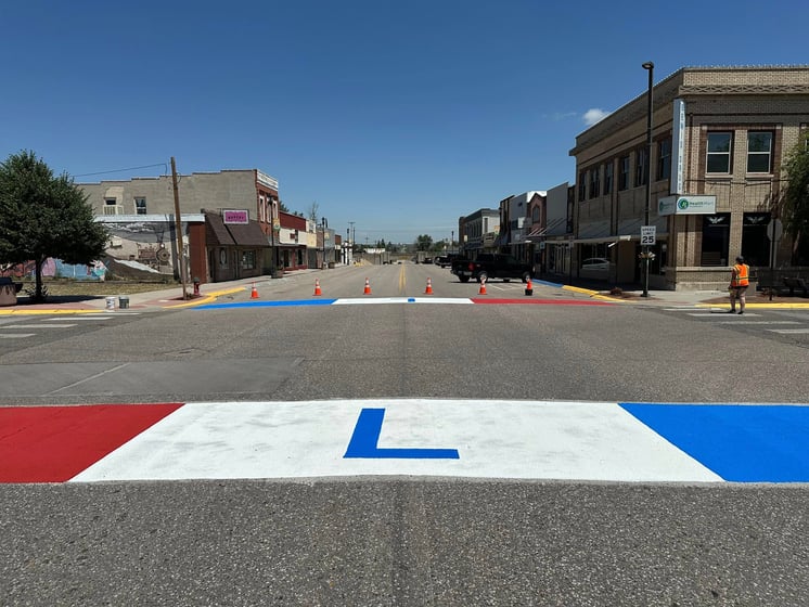 Members of the Activate Kimball group repainted the Lincoln Highway design on the downtown crosswalks on June 22.