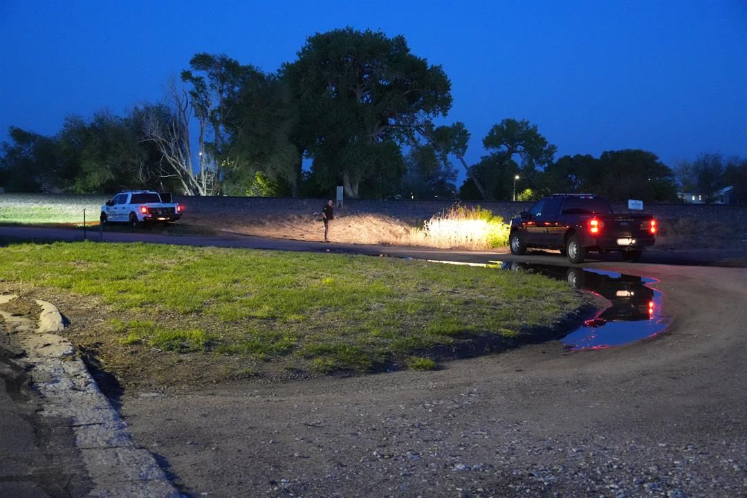 Authorities investigate an area near 7th Avenue and Maple Street where the body of Mattea Scheuerman was found in a drainage ditch on June 3, 2025.
