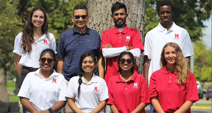 Top row, from left: Luise Marina Scapin, Dr. Bijesh Maharjan, Dilshan Ekanayaka, and Muhammed Lamin Bittaye. Bottom row, from left: Dulmini Anuradha, Sujani De Silva, Misara Bandara, and Delaney Pohl.
