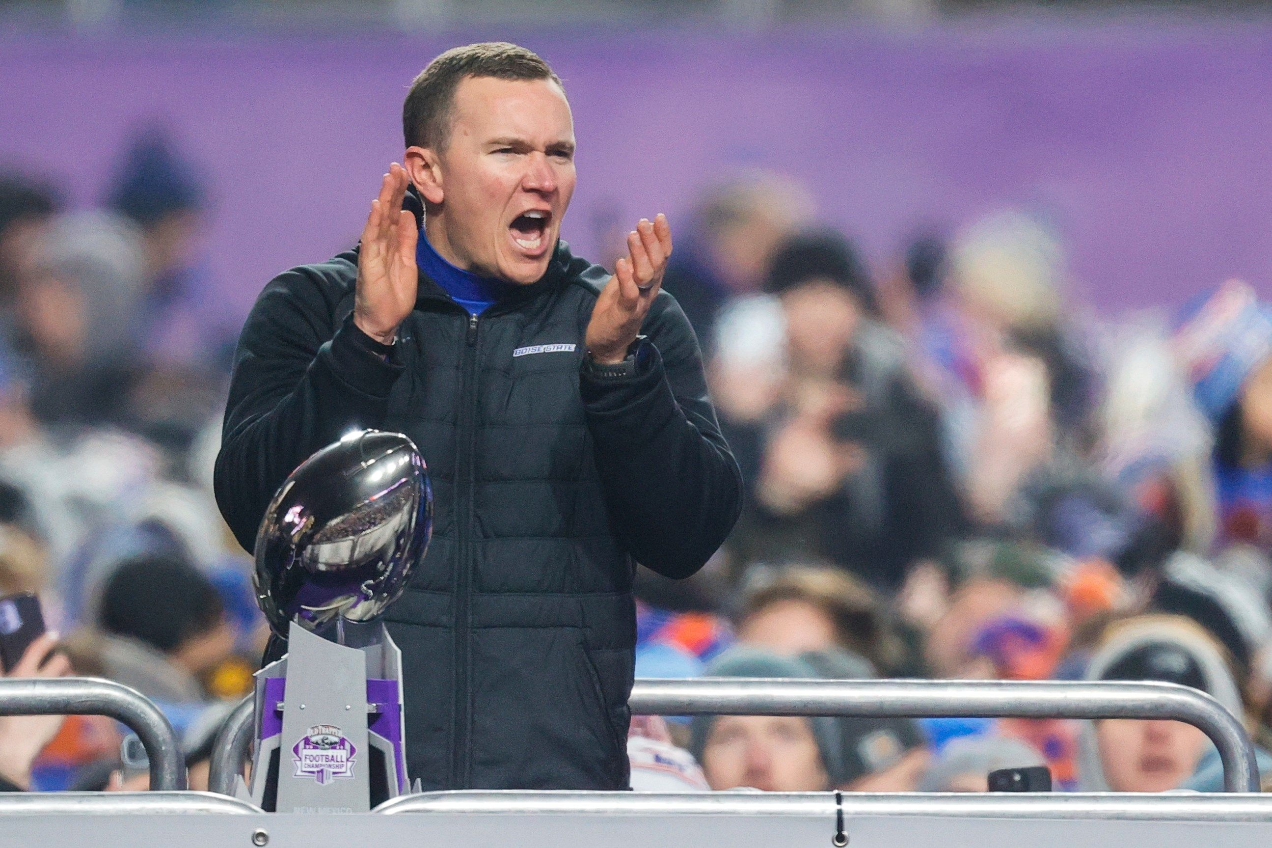 Boise State head coach Spencer Danielson celebrates after winning against UNLV in the Mountain West Championship NCAA college football game Friday, Dec. 6, 2024, in Boise, Idaho.