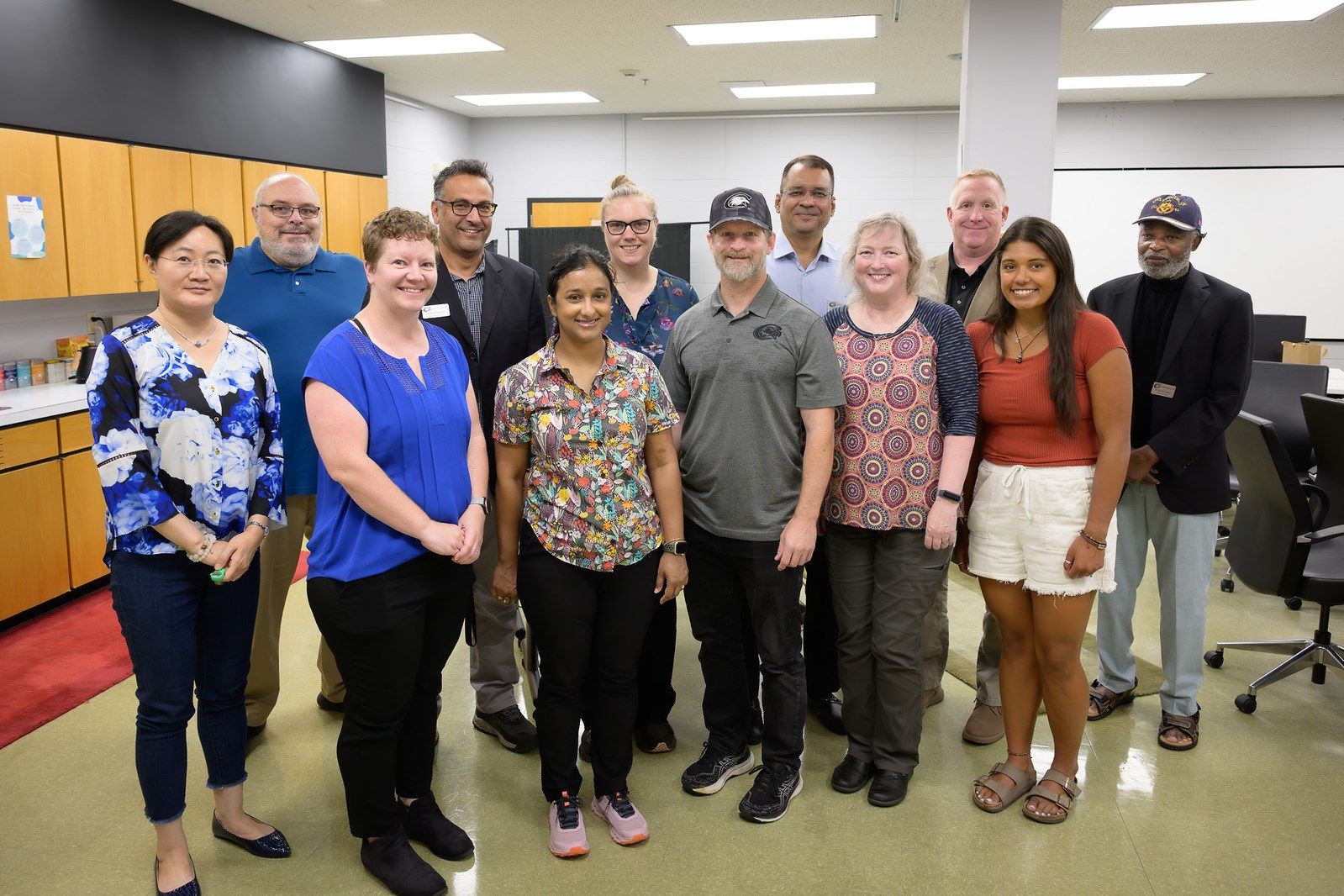 New Chadron State College faculty, August 2025. From left: Ruizhu Dai, Brett Greenwald, Rachel McKinley, M'bark Baddouh, Diya Ganguly, Jessica Meyers, Brian Grob, Amir Manzoor, Karla Abshire, Stephen Forsha, Jazlyn Reitz, and John Atsu-Swanzy.