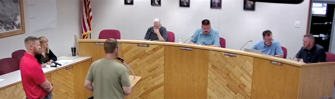 Assistant City Manager Josh Hanson and Electricity Superintendent Tom Mathine address questions from the city council Tuesday.