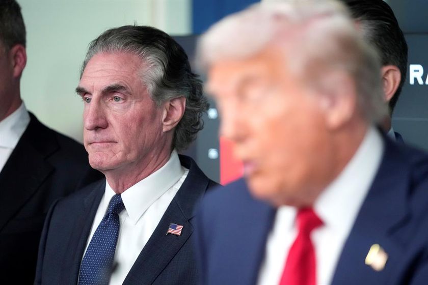 Interior Secretary Doug Burgum listens as President Donald Trump speaks with reporters in the James Brady Press Briefing Room at the White House, Monday, Aug. 11, 2025, in Washington.