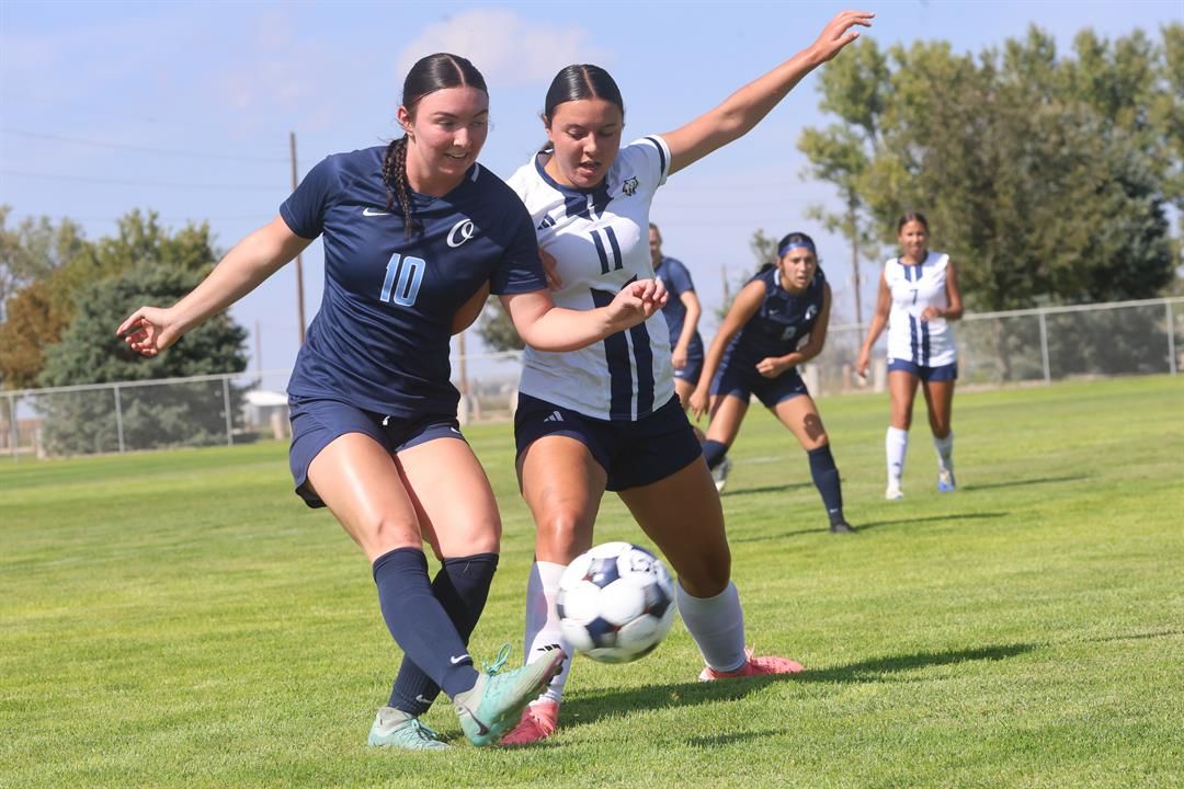 WNCC's Nia Trevino battles Otero's Isabel Wolf for the ball in their game Friday at Landers Soccer Complex.