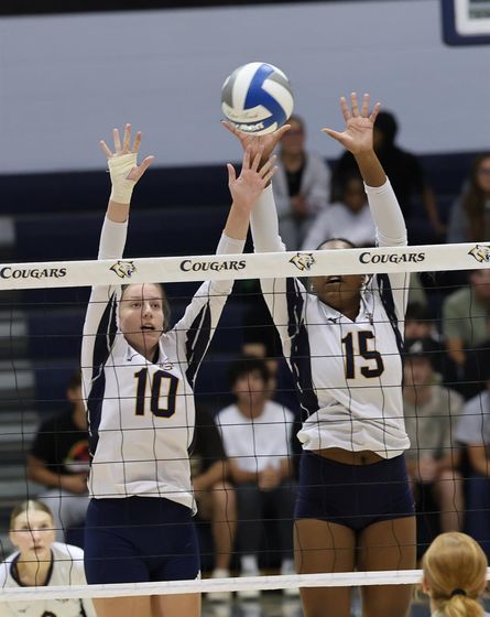 WNCC blockers Natalia Nowak (10) and Nadiyyah Northern (15) go up for a block in their home opener against NJC on Tuesday.