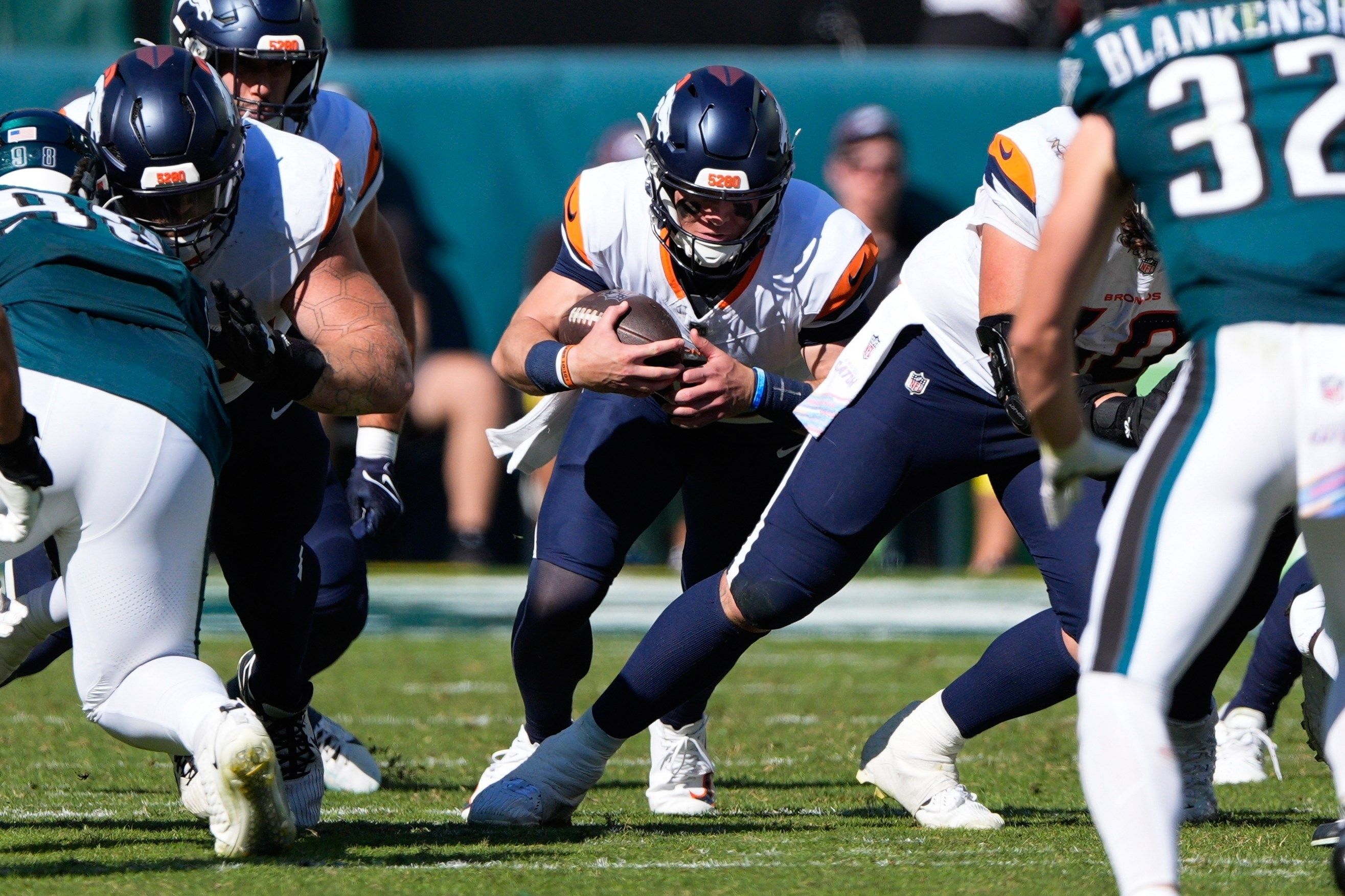Denver Broncos quarterback Bo Nix (10) runs the ball during the second half of an NFL football game against the Philadelphia Eagles on Sunday, Oct. 5, 2025, in Philadelphia.