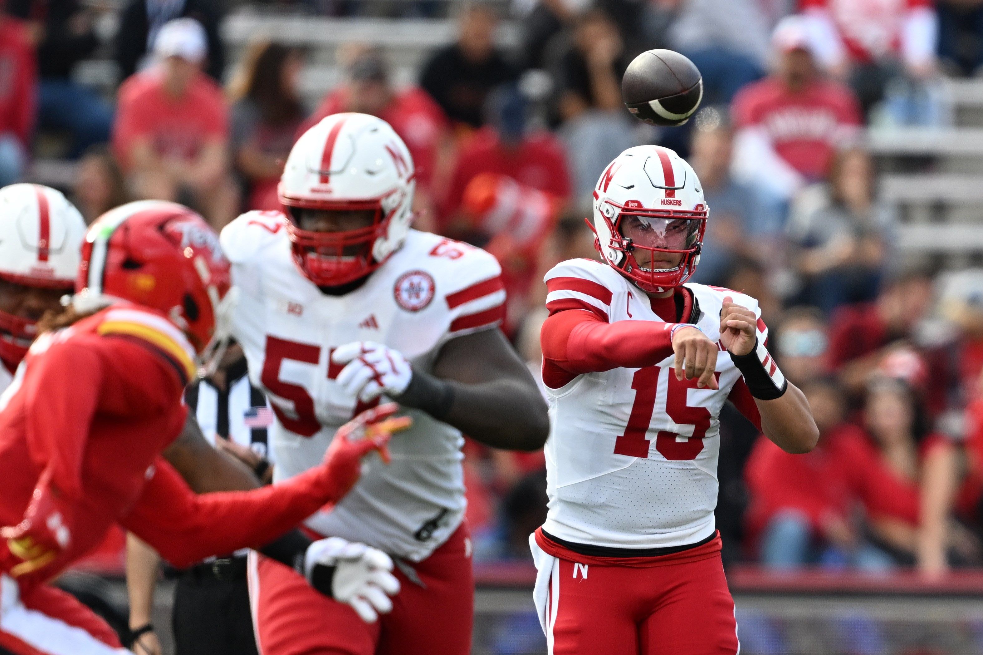 Nebraska quarterback Dylan Raiola (15 ) reacts after throwing a a pass for a touchdown against Maryland during the first half of a NCAA college football game, Saturday, Oct. 11, 2025, in College Park, Md.