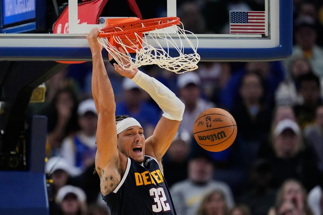Denver Nuggets forward Aaron Gordon dunks during the second half of an NBA basketball game against the Golden State Warriors, Thursday, Oct. 23, 2025, in San Francisco.