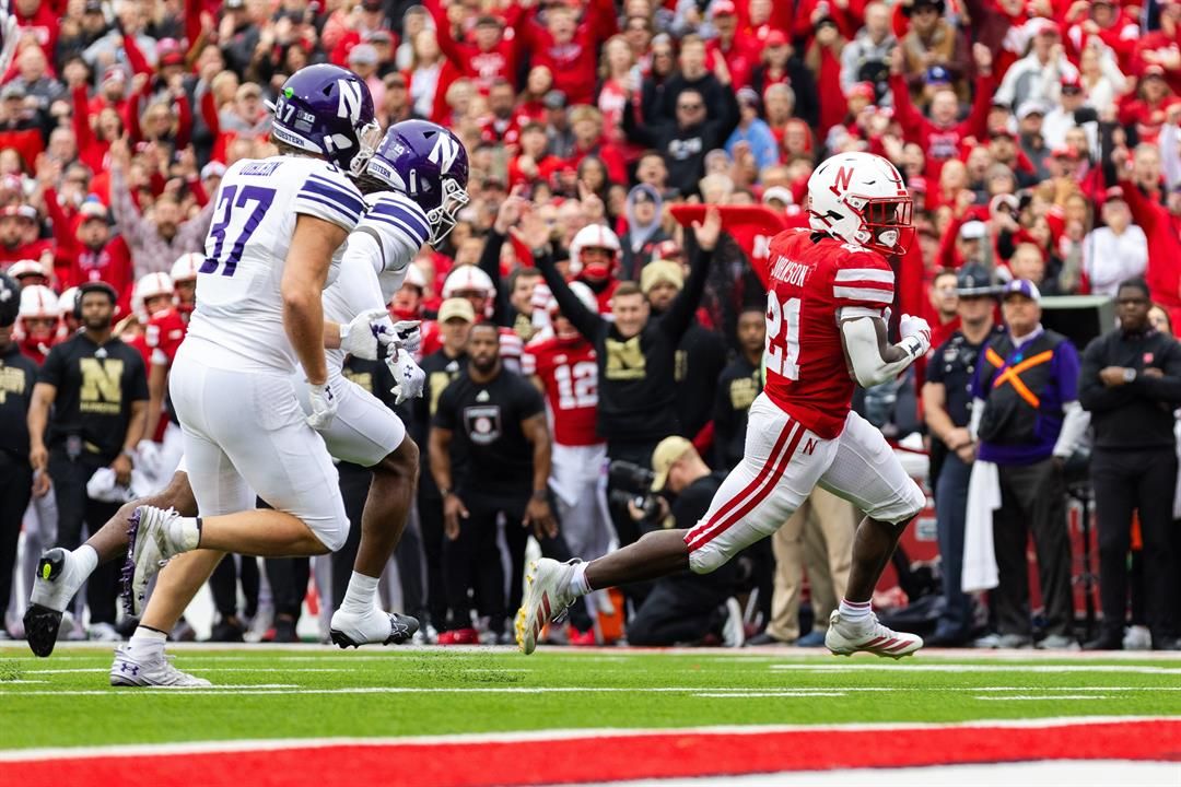 Nebraska running back Emmett Johnson (21) runs in for a touchdown against Northwestern during the first half of an NCAA college football game, Saturday, Oct. 25, 2025, in Lincoln, Neb.
