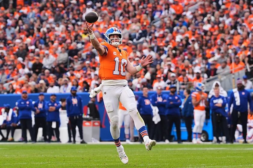 Denver Broncos quarterback Bo Nix throws a pass in the second half of an NFL football game against the Dallas Cowboys Sunday, Oct. 26, 2025, in Denver.