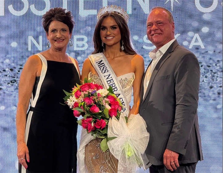 Pictured from left: Becca Eckert, Audrey Eckert and Mike Eckert. Miss Nebraska Audrey Eckert earned the title of Miss USA October 24.