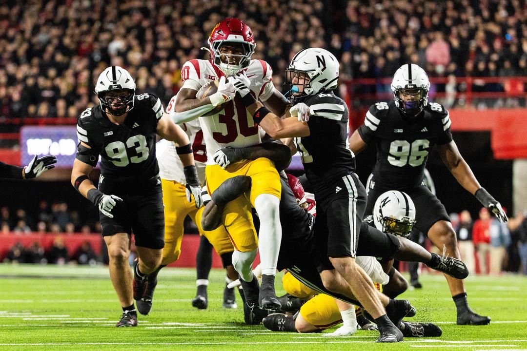 Southern California running back King Miller (30) carries the ball against Nebraska defensive back Rex Guthrie (21) during the second half of an NCAA college football game, Saturday, Nov. 1, 2025, in Lincoln, Neb.