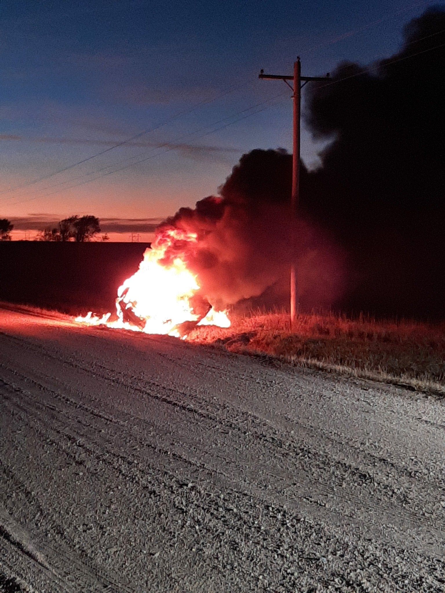 Vehicle fire south of Sutherland after rollover crash