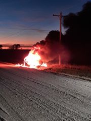 Vehicle fire south of Sutherland after rollover crash