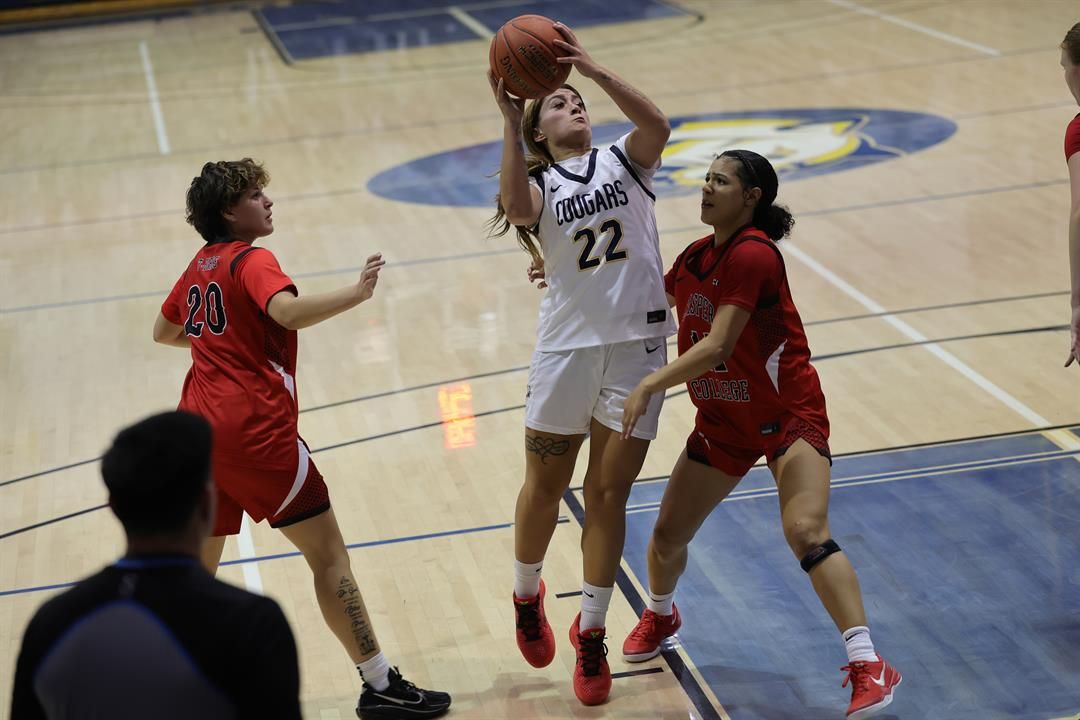 WNCC Ella Chesta-Carty goes up for a shot against a Casper defender.