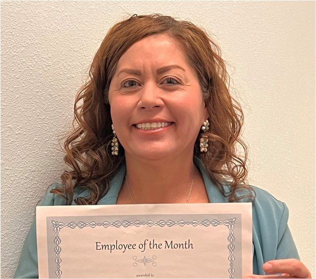Ana Schmidl received an Employee of the Month Certificate for the month of October at Kimball Health Services.